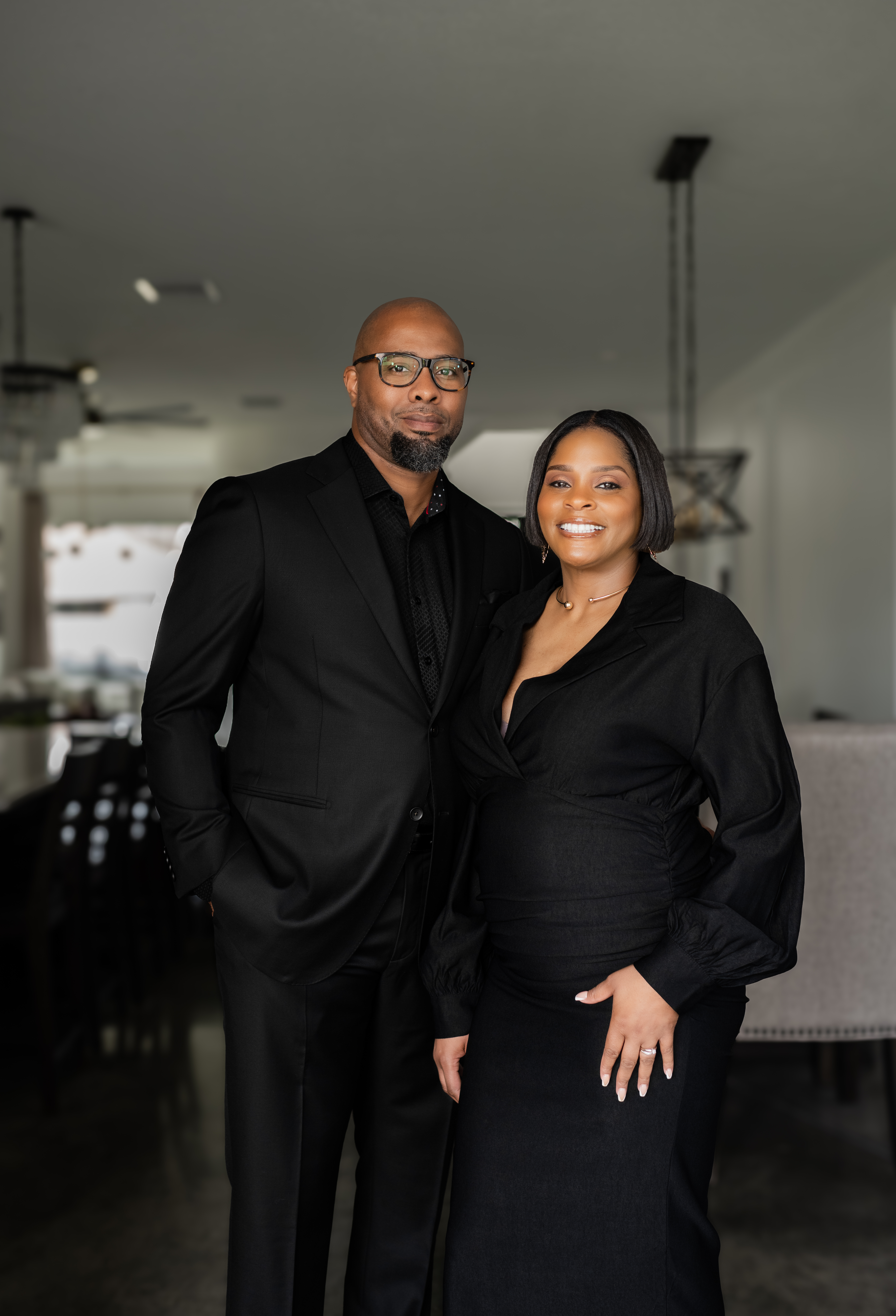 Front full body photo of business owners Mervin and Leann Walls.